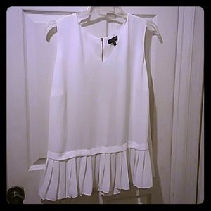 Limited sleeveless peplum blouse